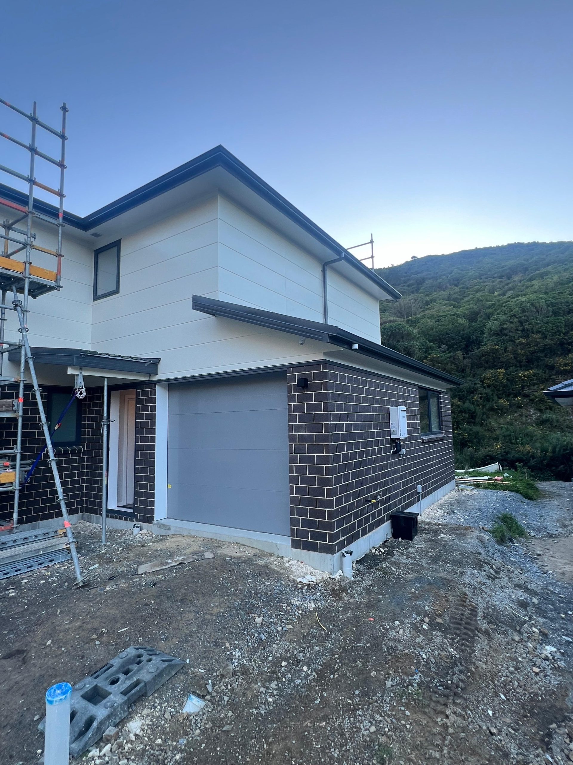a house under construction with a scaffolding