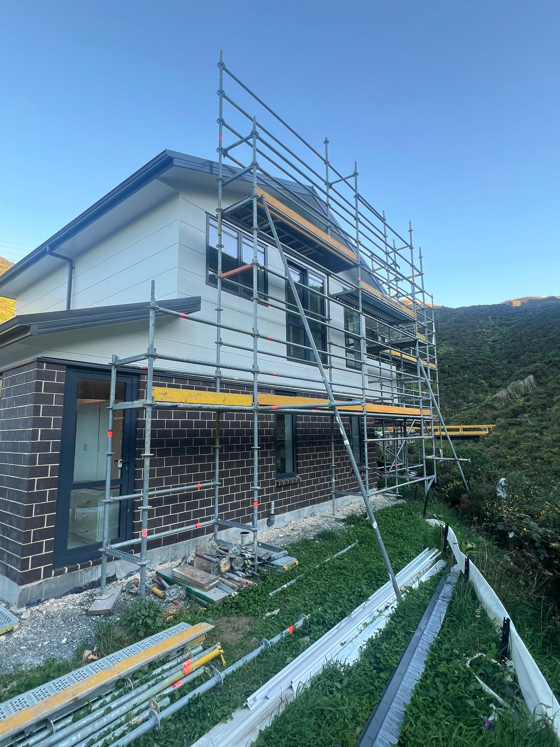 a building under construction with scaffolding | wellington | House Painting